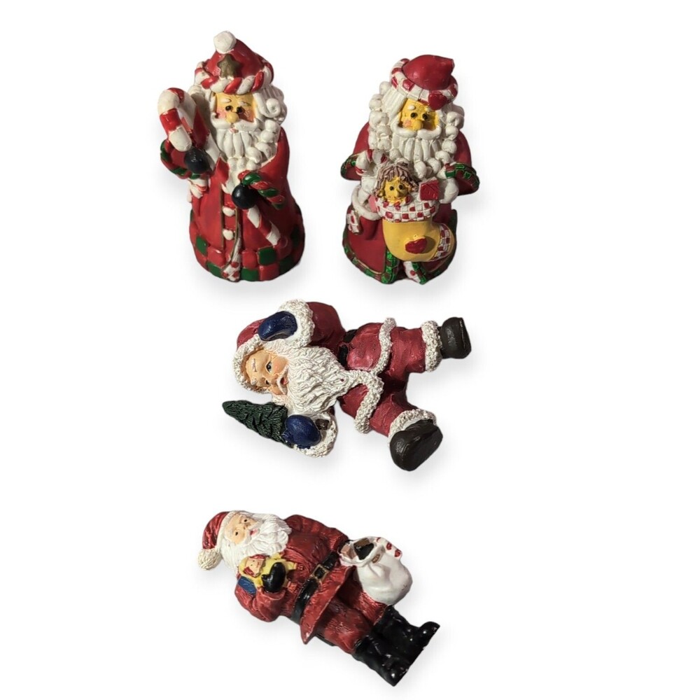 Vintage Set of 4 Christmas Santa Claus Ceramic Resin Figurines Collectible Decor